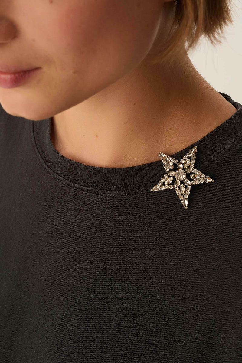 SPILLA STELLA IN METALLO ARGENTATO E STRASS
